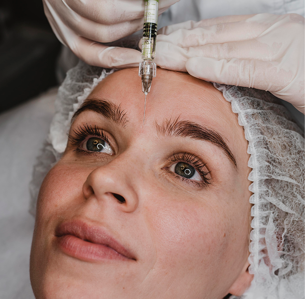 woman getting facial beauty injection wellness center 1